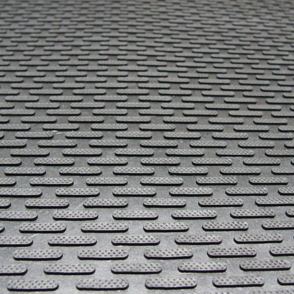 Rubber-Cal "Dura-Scraper Linear" Commercial Rubber Entrance Door Mat - 3/8 in x 3 ft x 5 ft - Black