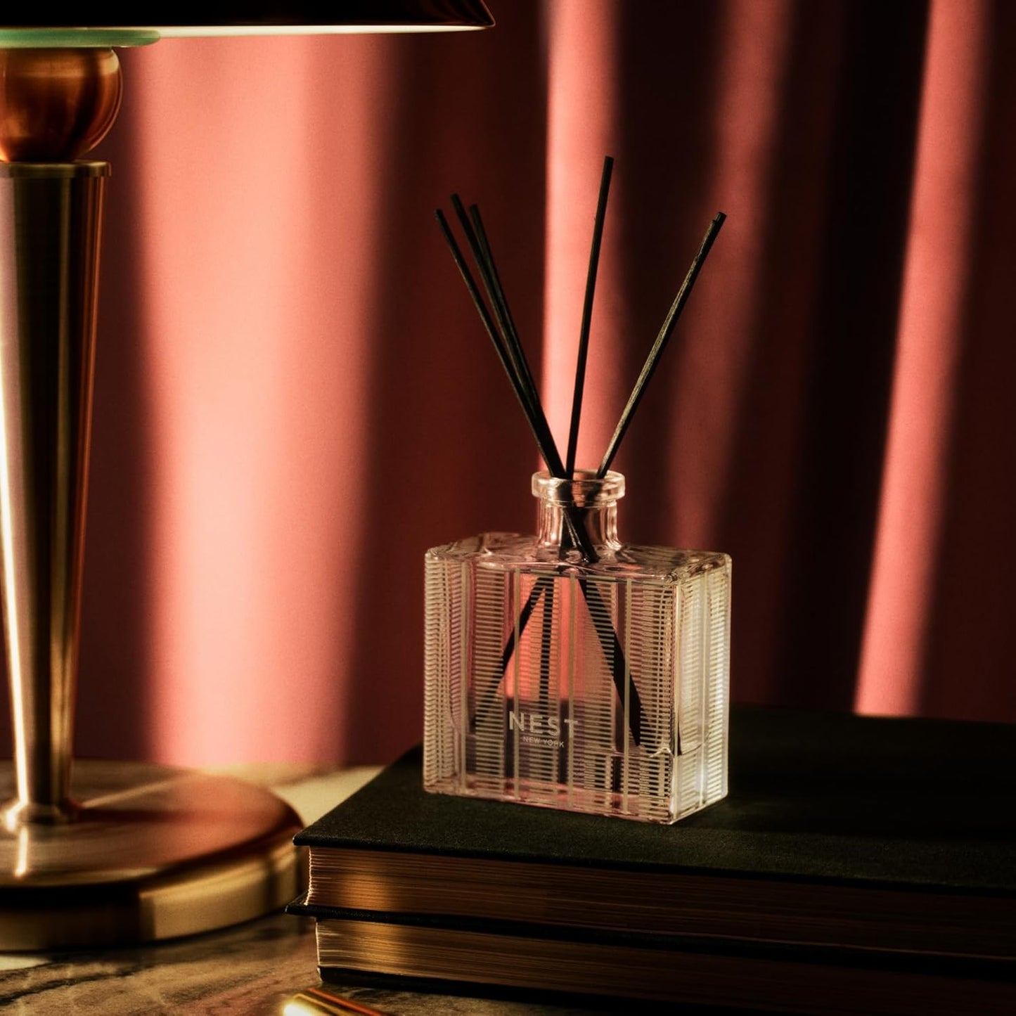 NEST New York Reed Diffuser, Moroccan Amber - 5.9 fl oz - Fragrance for Up to 90 Days - Reusable, Refillable Glass Holder - Includes 8 All-Natural Reed Sticks - Flame Free