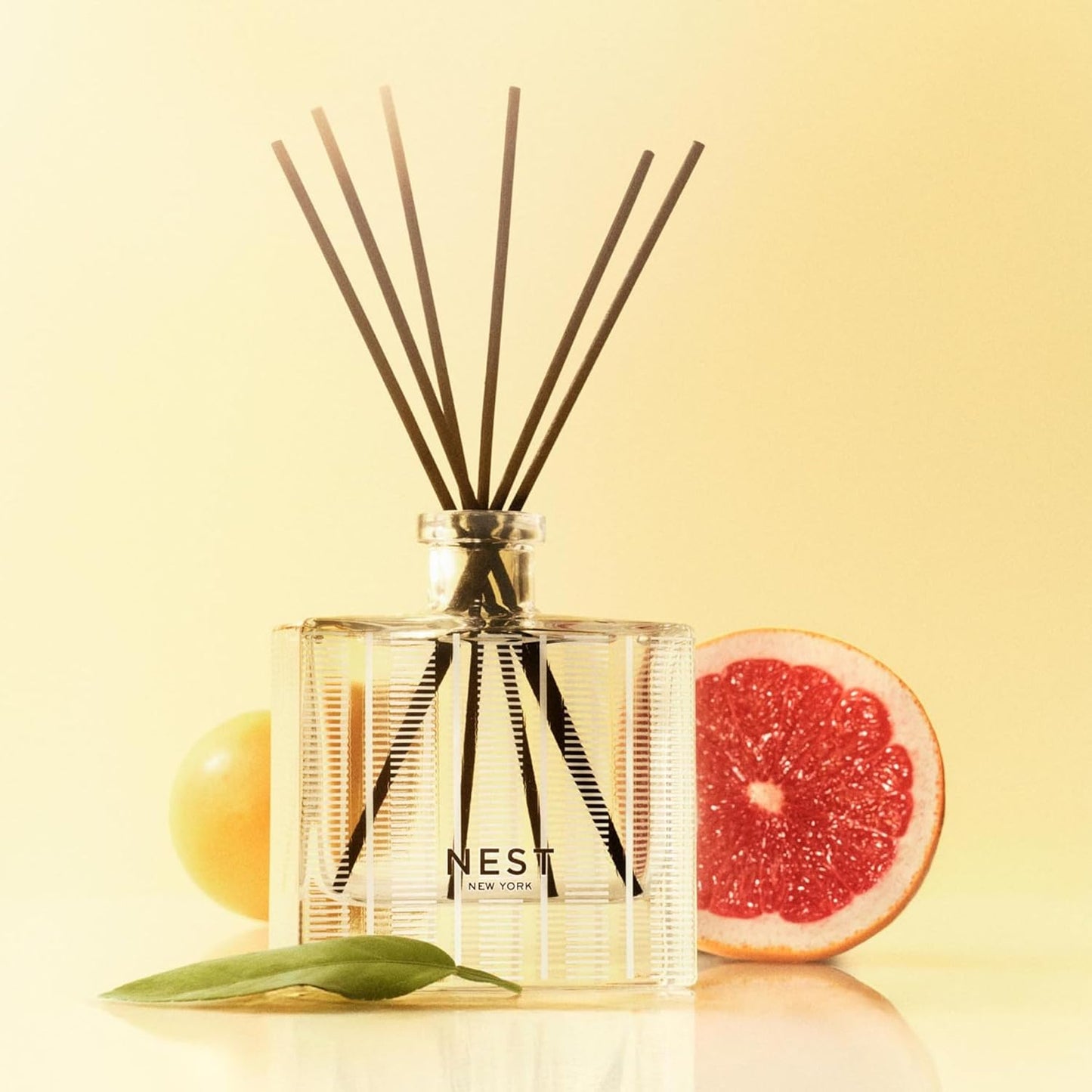 NEST New York Reed Diffuser, Moroccan Amber - 5.9 fl oz - Fragrance for Up to 90 Days - Reusable, Refillable Glass Holder - Includes 8 All-Natural Reed Sticks - Flame Free