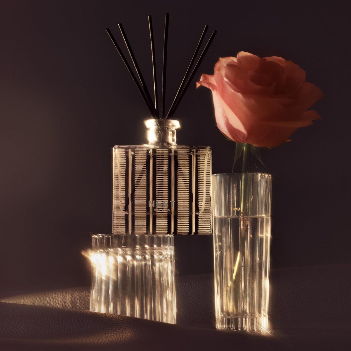 NEST New York Reed Diffuser, Moroccan Amber - 5.9 fl oz - Fragrance for Up to 90 Days - Reusable, Refillable Glass Holder - Includes 8 All-Natural Reed Sticks - Flame Free