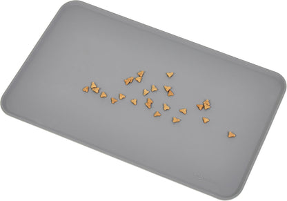 Amazon Basics Waterproof Non-Slip Silicone Pet Feeding Mat with Raised Edges for Food and Water Bowls, Easy to Clean Pet Placemat to Protect Floors, 18.5" x 11.5", Black