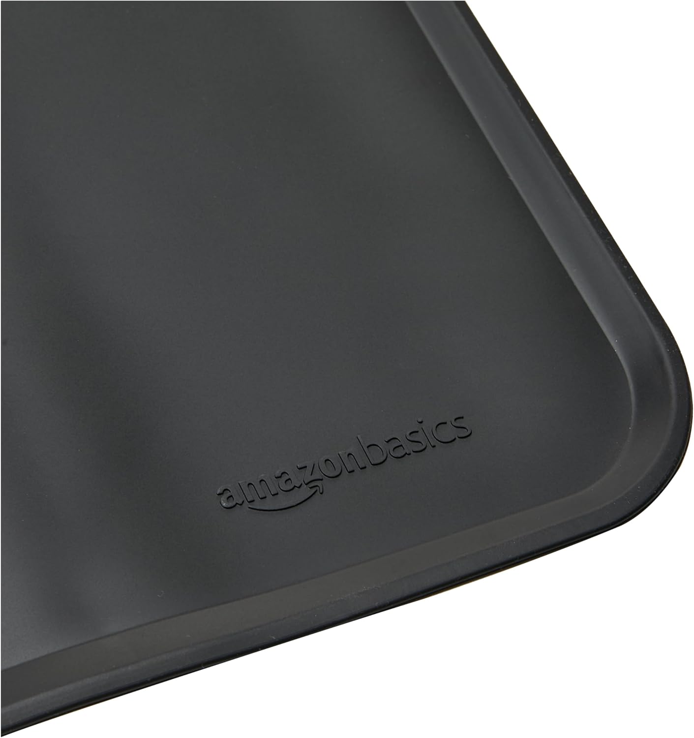 Amazon Basics Waterproof Non-Slip Silicone Pet Feeding Mat with Raised Edges for Food and Water Bowls, Easy to Clean Pet Placemat to Protect Floors, 18.5" x 11.5", Black