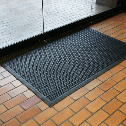 Rubber-Cal "Dura-Scraper Linear" Commercial Rubber Entrance Door Mat - 3/8 in x 3 ft x 5 ft - Black