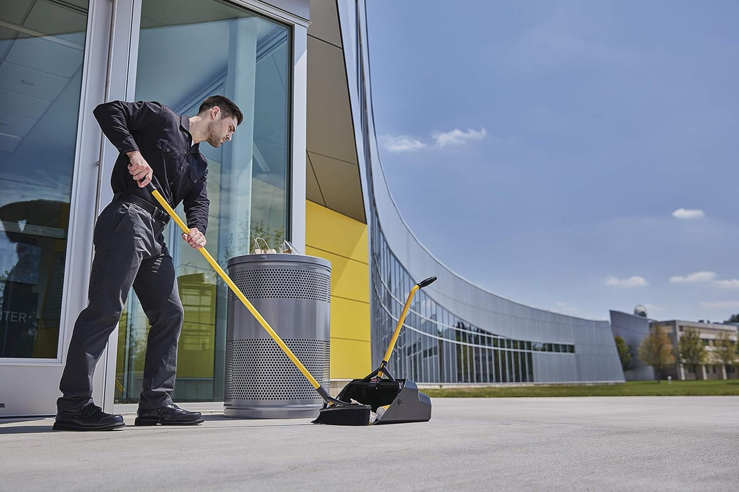 Rubbermaid Commercial Products Maximizer 36" Push to Center Push Broom Polypropylene Fill Black Angled Sides Medium Bristles for Indoor/Outdoor Multi-Surface Use