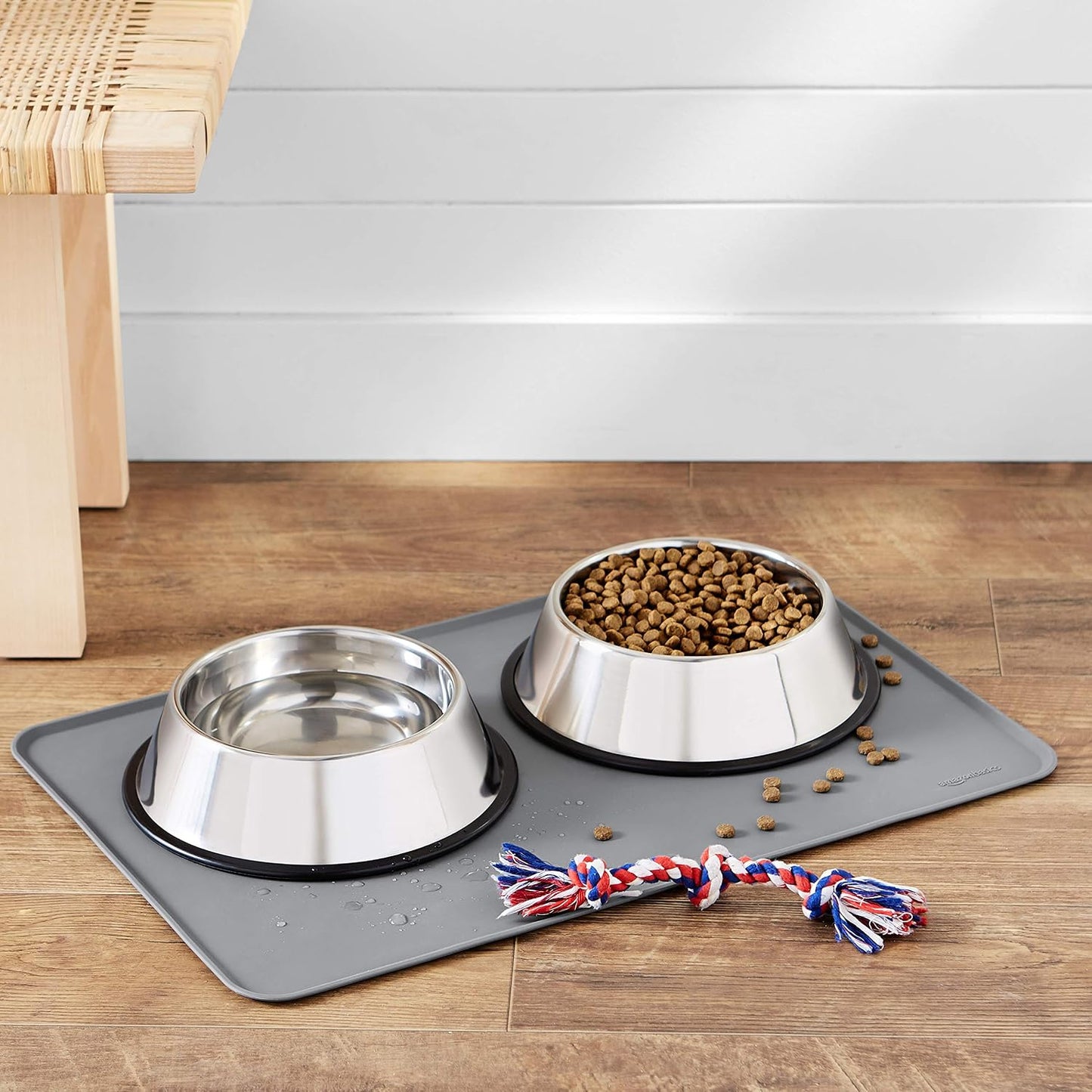 Amazon Basics Waterproof Non-Slip Silicone Pet Feeding Mat with Raised Edges for Food and Water Bowls, Easy to Clean Pet Placemat to Protect Floors, 18.5" x 11.5", Black