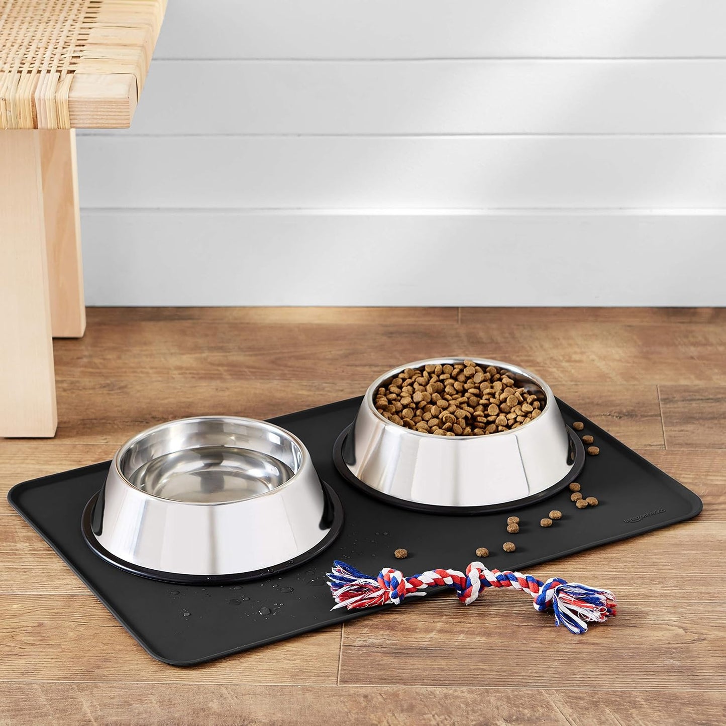 Amazon Basics Waterproof Non-Slip Silicone Pet Feeding Mat with Raised Edges for Food and Water Bowls, Easy to Clean Pet Placemat to Protect Floors, 18.5" x 11.5", Black