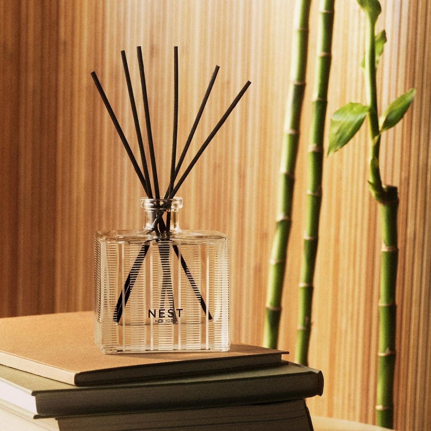 NEST New York Reed Diffuser, Moroccan Amber - 5.9 fl oz - Fragrance for Up to 90 Days - Reusable, Refillable Glass Holder - Includes 8 All-Natural Reed Sticks - Flame Free