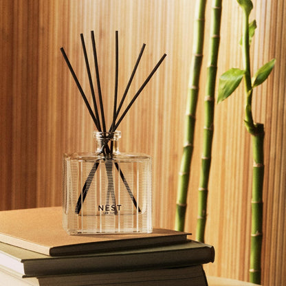 NEST New York Reed Diffuser, Moroccan Amber - 5.9 fl oz - Fragrance for Up to 90 Days - Reusable, Refillable Glass Holder - Includes 8 All-Natural Reed Sticks - Flame Free